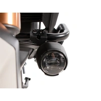 Black adapter set for original auxiliary headlights for combination with Hepco&Becker engine guard for Honda NT 1100 / DCT / ES (2025-)